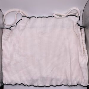 White cropped tank top with black edge detail